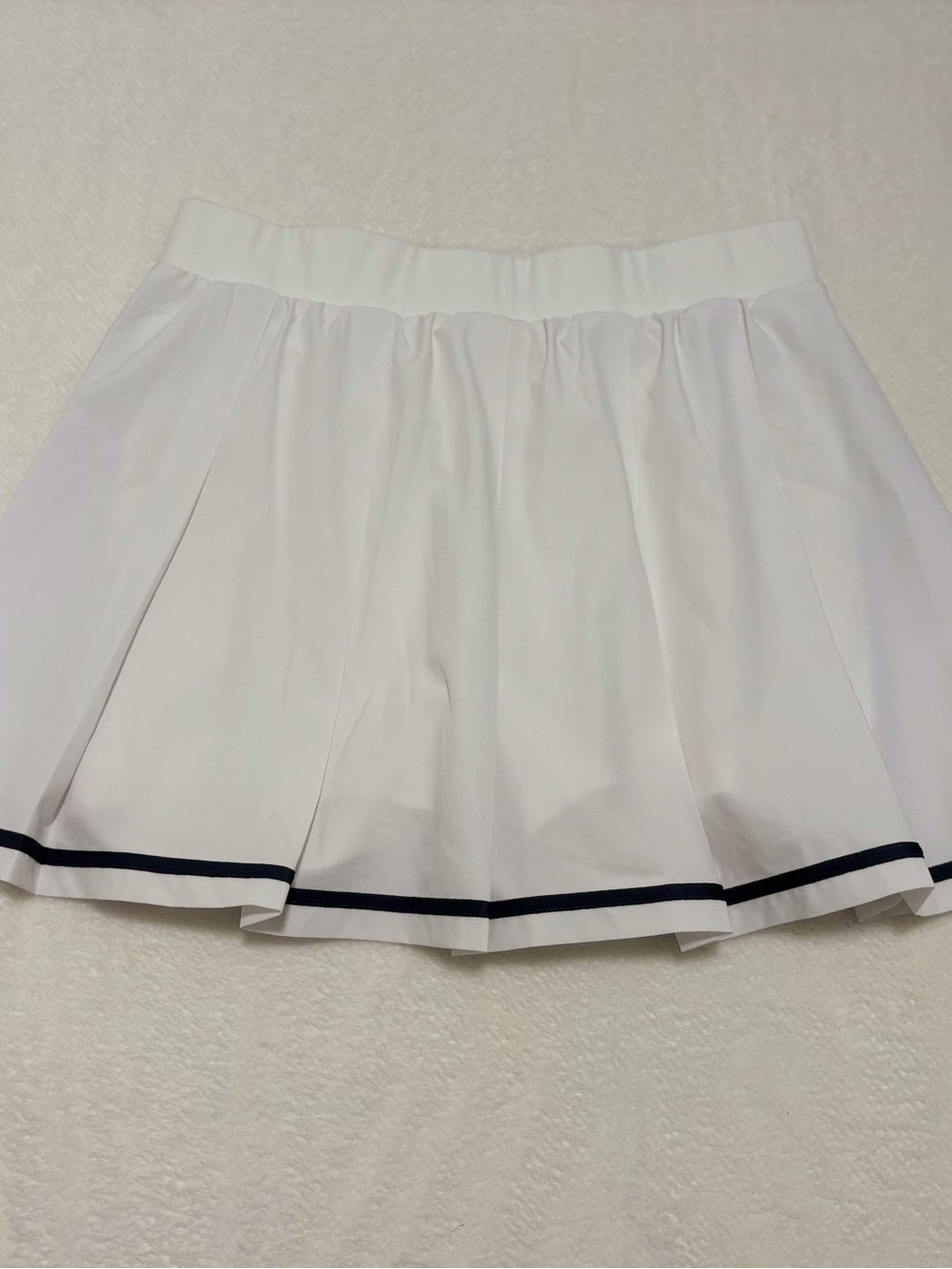 Varley White Pleated Tennis Mini Skirt with Navy Hem